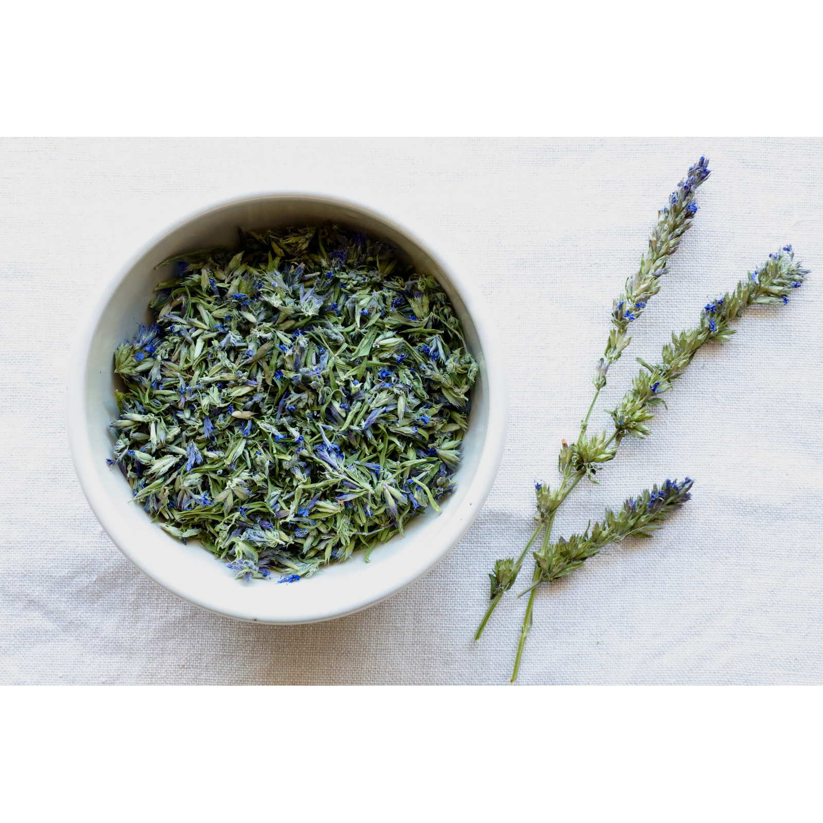 Photo of Hyssop O in bowl and on cloth for display